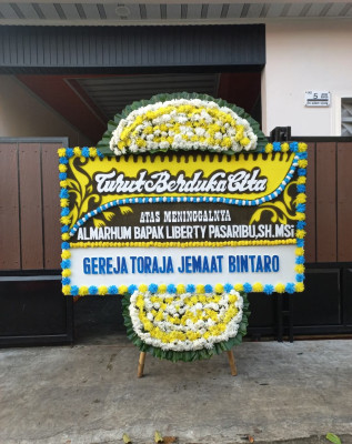 Papan Bunga Duka di Bukit Batu